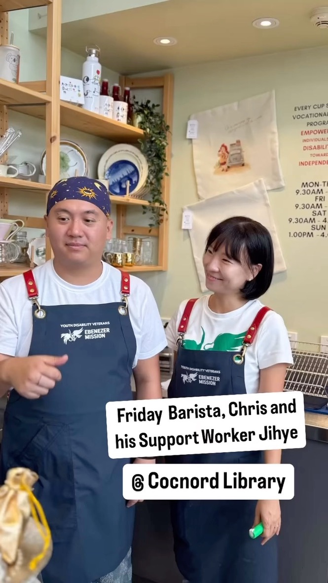 Chris working as a Friday barista with his support worker at Concord Library