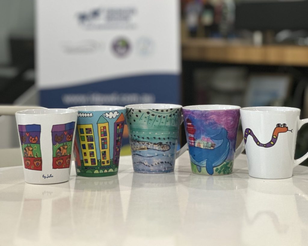 Ceramic cups decorated with original artwork