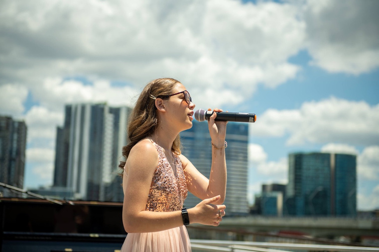 Blind singer Summer Giddings performing with Ebenezer Mission